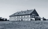 Остров Большая Муксалма. Урочище — «Иисусова пустынь». Здание бывшей гостиницы для паломников, превращенное в мужской барак Соловецкой тюрьмы. А.А.Баев содержался в одной из камер на втором этаже. В камере было два окна и, судя по архитектуре здания, его