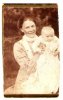 Мария Петровна Акимова с первенцем Лёвой.  Правая часть, где стоял Константин, оборвана.
Так страховались люди от новых визитов чекистов в их дома.