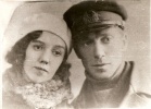 На фотографии изображен мой (Айходжаевой Юлии Евгеньевны) дедушка, Снежков Николай Сергеевич вместе с супругой Снежковой Мартой Васильевной. Они поженились в 1927 г., фотография предположительно сделана в начале 1930- х годов.