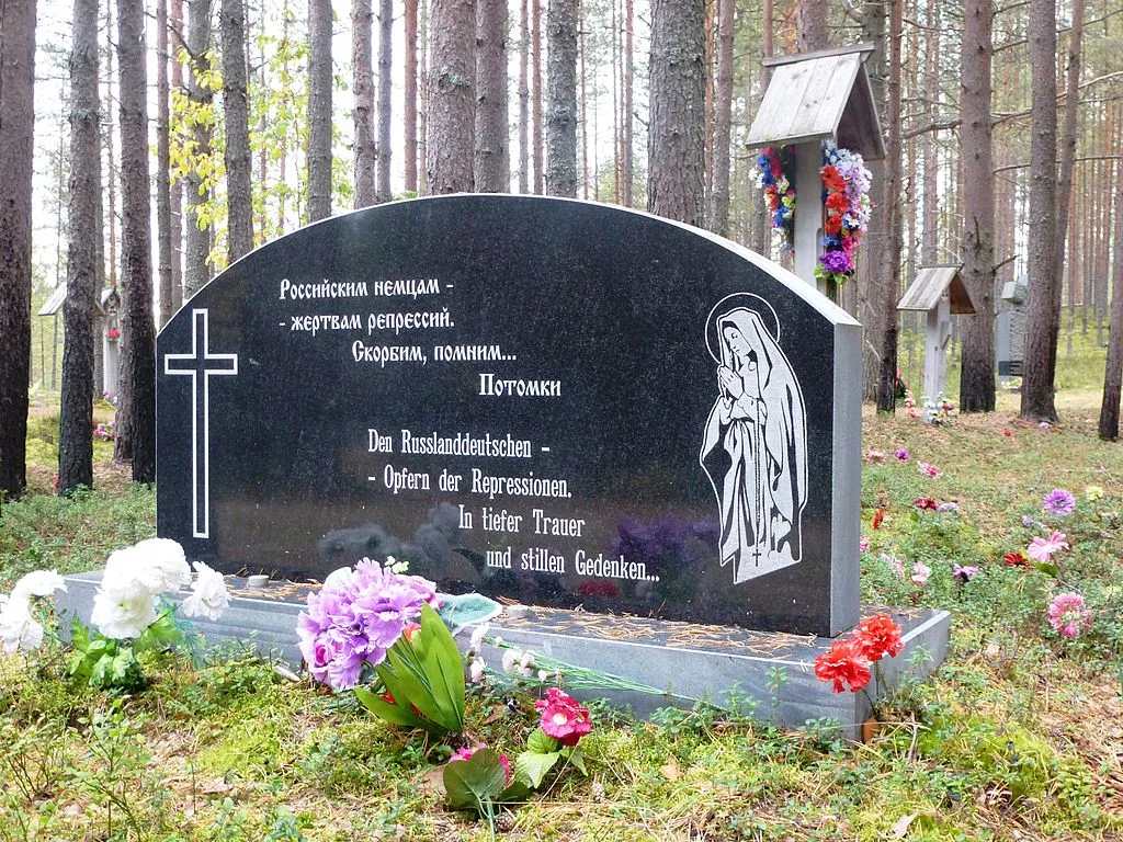Memorial sign at the site of mass executions in the Sandarmokh tract near the town of Medvezhyegorsk, Republic of Karelia.