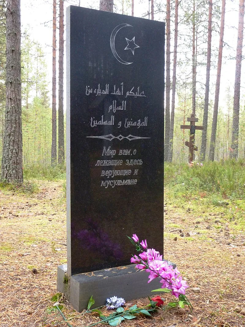 Memorial sign at the site of mass executions in the Sandarmokh tract near the town of Medvezhyegorsk, Republic of Karelia.
